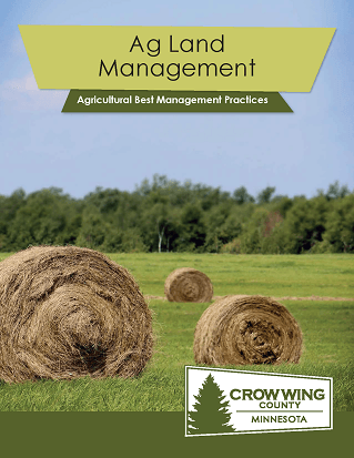 Brochure cover for ag land management showing a farm field with hay bales Opens in new window